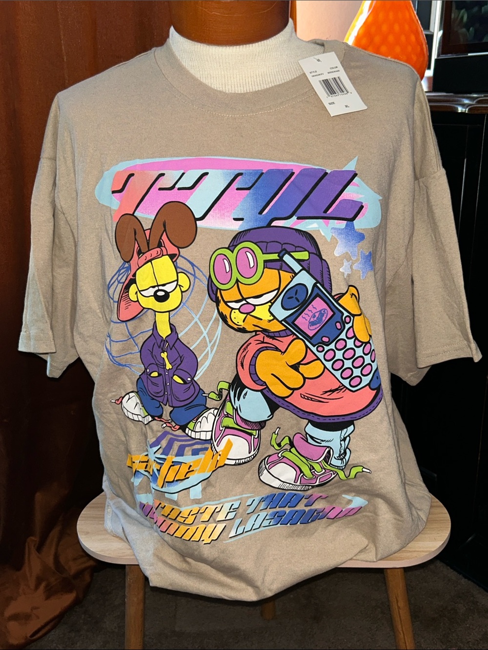 Nickelodeon Beige Tee with Neon Cartoon Graphic